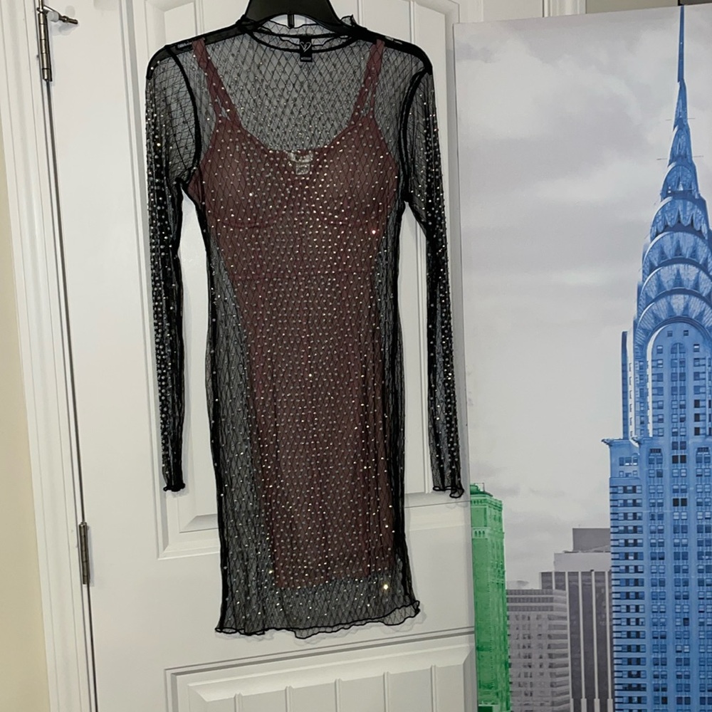 Beaded Net dress, long sleeve, 
New no tags, size L junior equal to adult Small